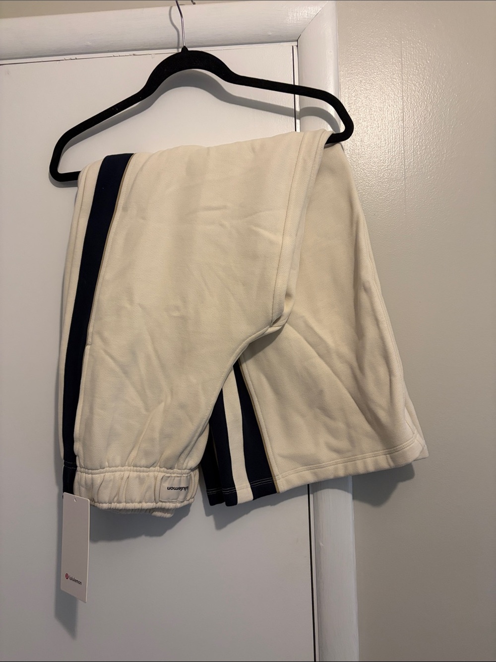 Lululemon Cream Athletic Shorts with Navy Side Stripes